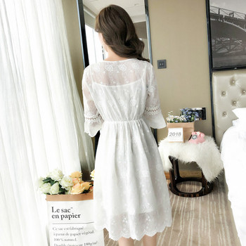 Κομψό γυναικείο φόρεμα με ντεκολτέ σε σχήμα V σε μαύρο και άσπρο