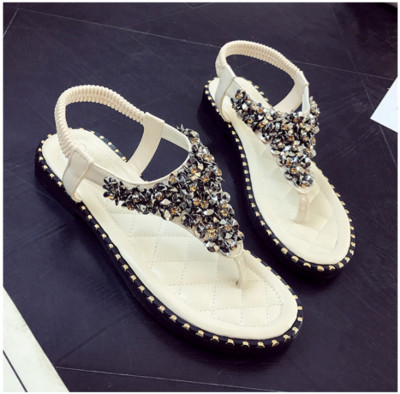 Καθημερινά γυναικεία σανδάλια σε δύο χρώματα με διακοσμητικές πέτρες