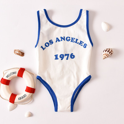 Modern gyerek teljes fürdőruha - unisex, felirattal