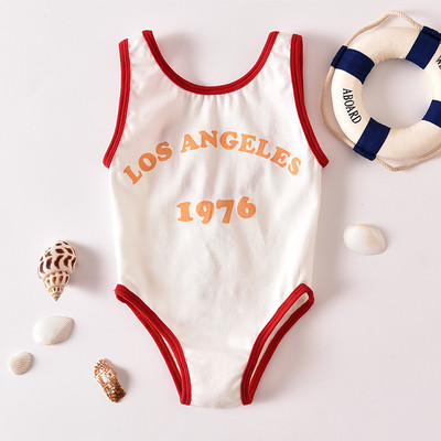 Modern gyerek teljes fürdőruha - unisex, felirattal