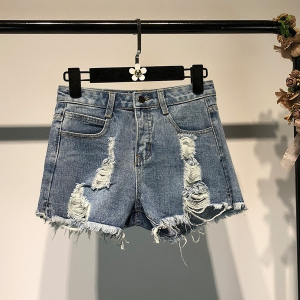Modern női rövidnadrág - szakadt