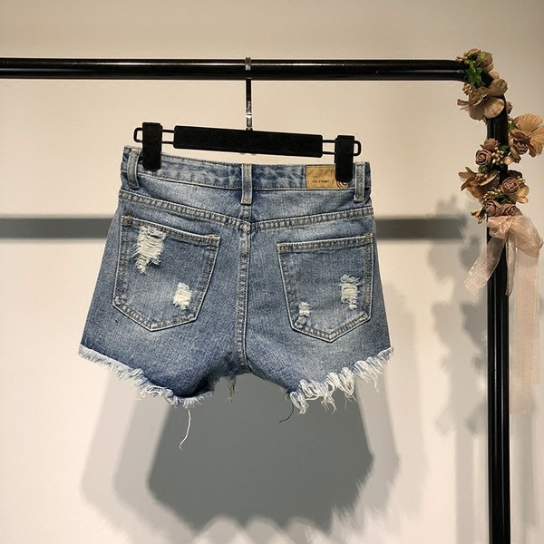 Modern női rövidnadrág - szakadt