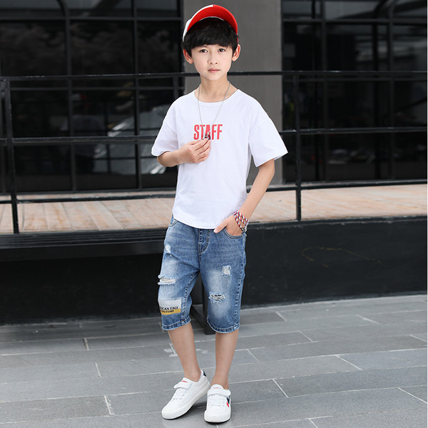 Blugi pentru copii cu motive rupte, petice și inscripție