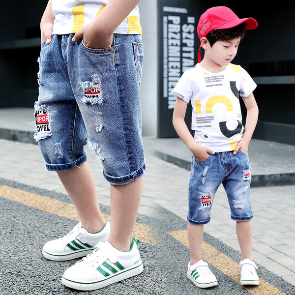 Blugi copii moderni 3/4 cu talie inalta de culoare inchisa cu petice si motive rupte