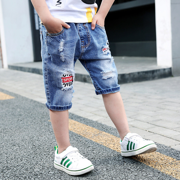 Blugi copii moderni 3/4 cu talie inalta de culoare inchisa cu petice si motive rupte