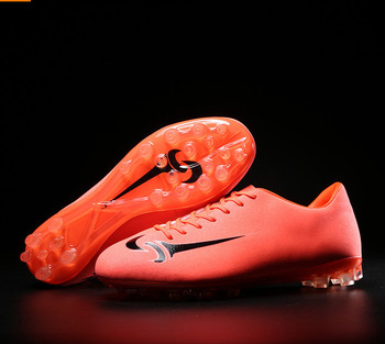 Ανδρικά παπούτσια ποδοσφαίρου σε μαύρο και πορτοκαλί χρώμα