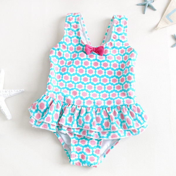 Costum de baie intreg pentru copii de culoare deschisa cu decor floral si panglica