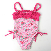 Costum de baie modern pentru copii de culoare deschisă cu motive florale și legături laterale