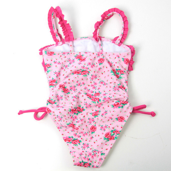 Costum de baie modern pentru copii de culoare deschisă cu motive florale și legături laterale