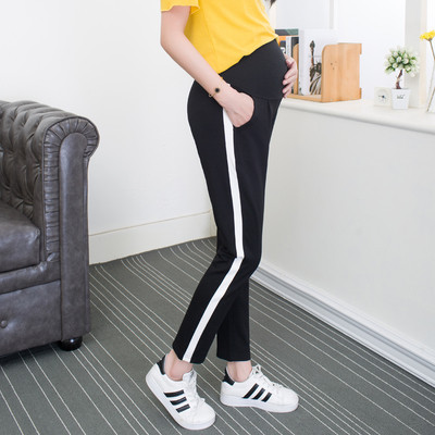 Pantaloni sport și casual de damă cu margine albă