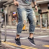 Ευρύ μοτίβο ανδρικό τζιν με σχισμένα μοτίβα