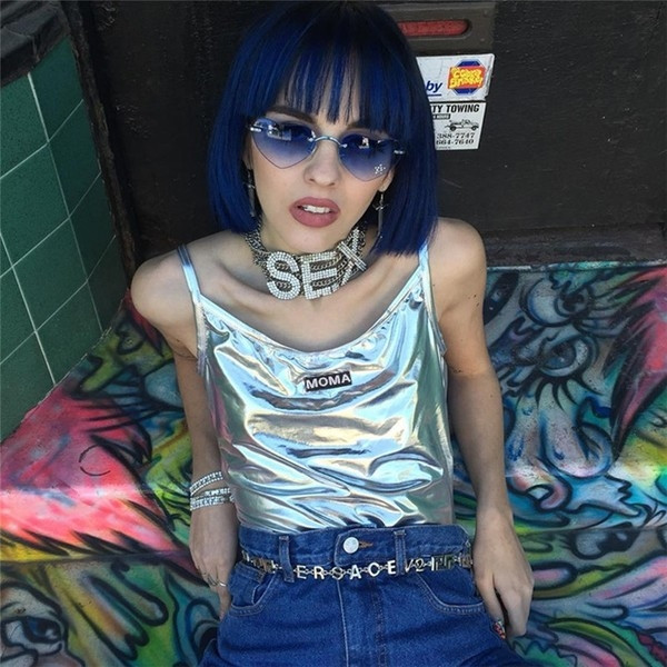 Нестандартен дамски цял бански в сребърен цвят с щампа и отворен гръб