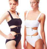 Актуален дамски цял бански в черен и бял цвят с ципове