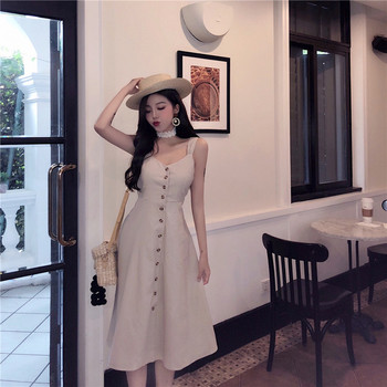 Дълга рокля с презрамки, копчета и панделка на гърба 