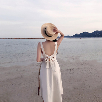 Дълга рокля с презрамки, копчета и панделка на гърба 