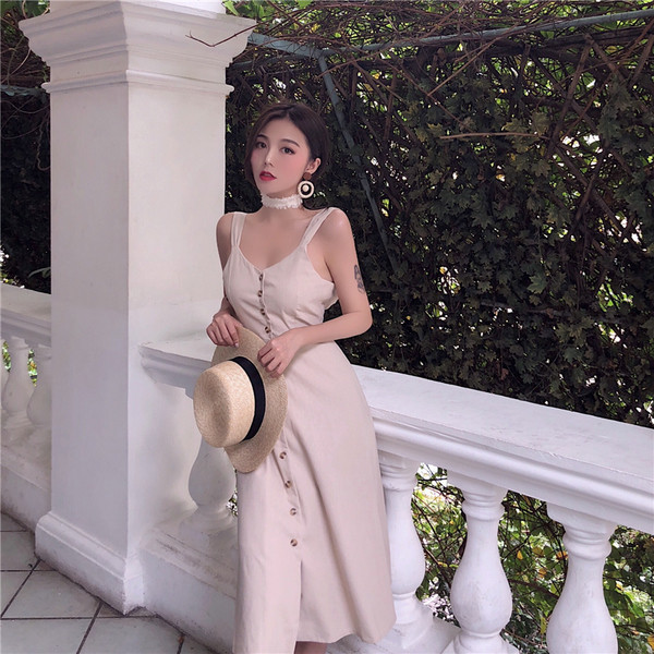 Дълга рокля с презрамки, копчета и панделка на гърба 