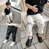 Blugi de copii pentru baieti cu motive rupte si broderii