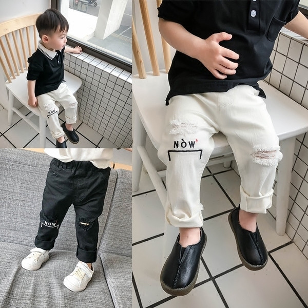 Blugi de copii pentru baieti cu motive rupte si broderii