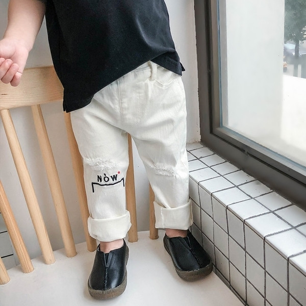 Blugi de copii pentru baieti cu motive rupte si broderii