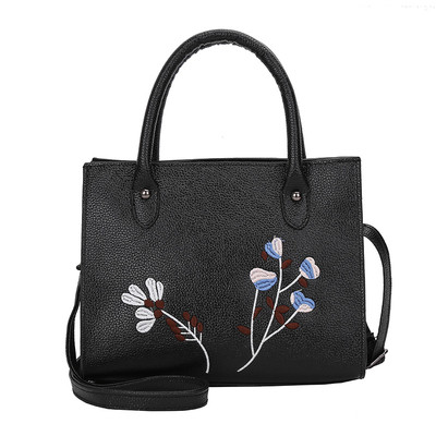 Γυναικεία τσάντα με κεντήματα σε διάφορα χρώματα