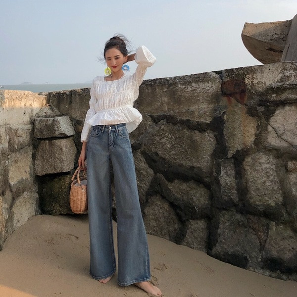 Blugi de dama decupati cu talie inalta