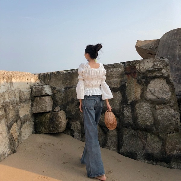 Blugi de dama decupati cu talie inalta