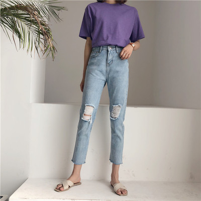 Μοντέρνα γυναικεία τζιν με σκισμένα μοτίβα και ψηλή μέση