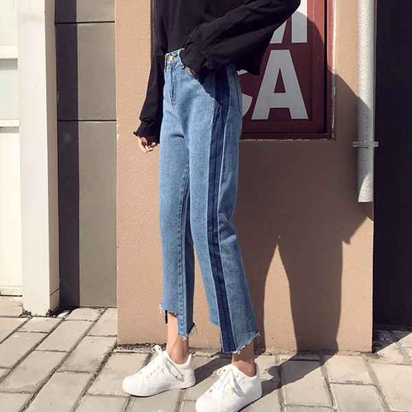 Blugi de dama cu talie inalta si margini inchise la culoare