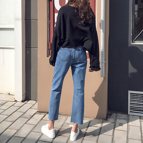 Blugi de dama cu talie inalta si margini inchise la culoare