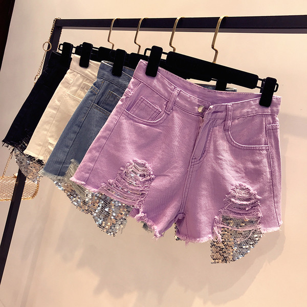 Дамски къси дънки в четири цвята, разкъсани с лъскав елемент