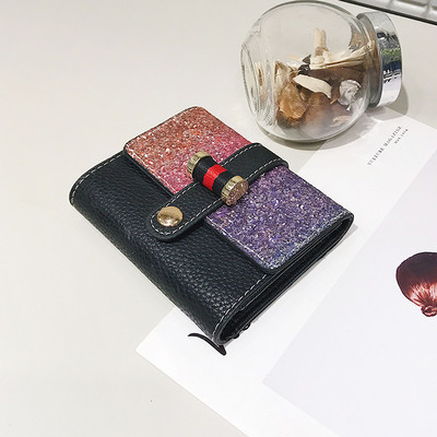 Γυναικείο μικρό πορτοφόλι με λαμπερό στοιχείο σε δύο χρώματα