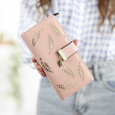 Women`s long wallet with decoration in four colors