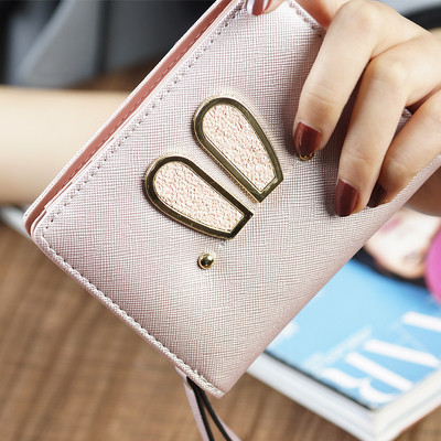 Γυναικείο μικρό πορτοφόλι σε τέσσερα χρώματα με μεταλλική διακόσμηση