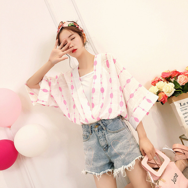 Cămașă modernă de damă cu mâneci largi și decolteu în V