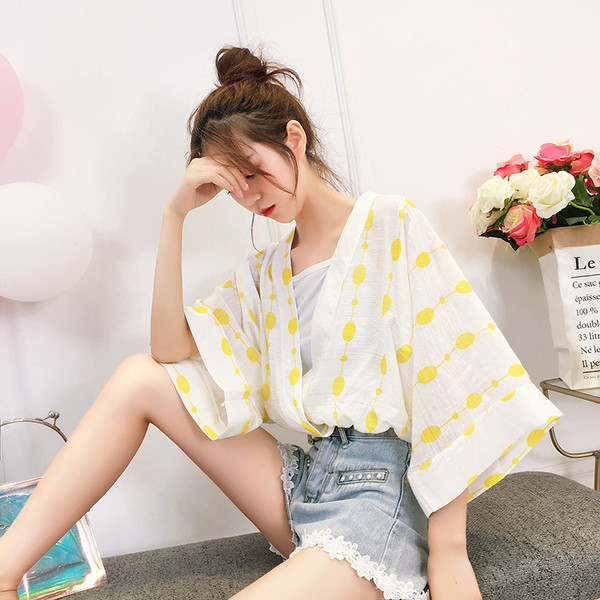 Cămașă modernă de damă cu mâneci largi și decolteu în V