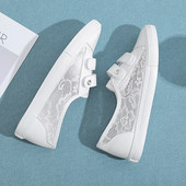 Ανδρικά πάνινα παπούτσια σε μαύρο και άσπρο με στοιχεία από οικολογικό δέρμα