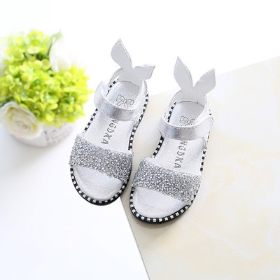 Modern, fekete, fehér és rózsaszín kövekkel díszített gyerekszandál lányoknak