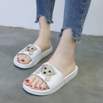 Papuci de damă cu aplicație în alb și negru