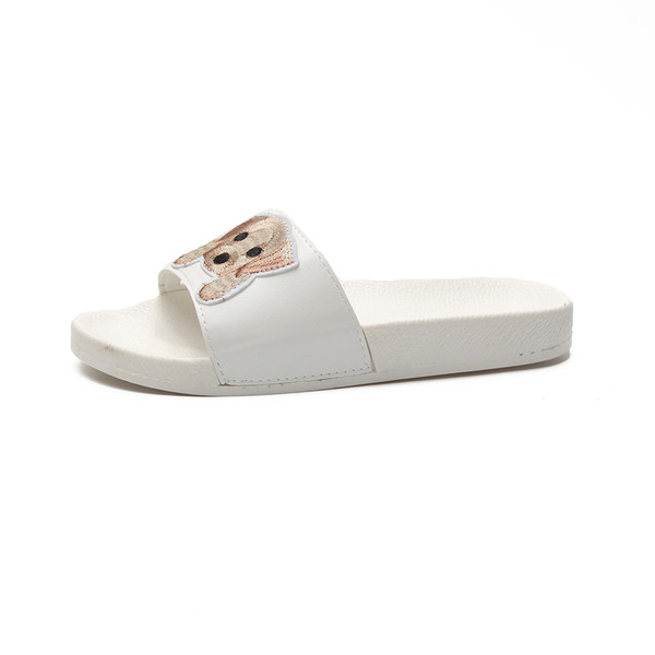 Papuci de damă cu aplicație în alb și negru