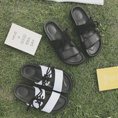 Δερμάτινες παντόφλες για γυναίκες με δεσμούς σε λεύκο και μαύρο χρώμα