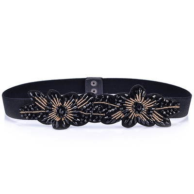 Women`s belt with floral decoration and decorative beads