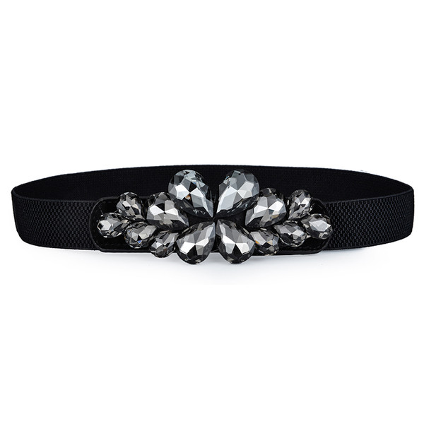 Γυναικεία ζώνη  με μεταλληκό στοιχείο  με χρωματιστές διακοσμητικές πέτρες