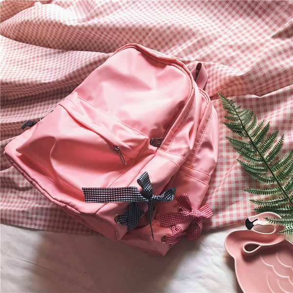 Rucsac de damă de zi cu zi cu o panglică decorativă în roz și negru