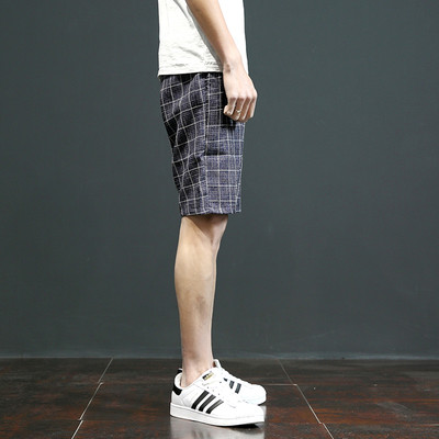 Pantaloni scurți eleganti în carouri, cu buzunare