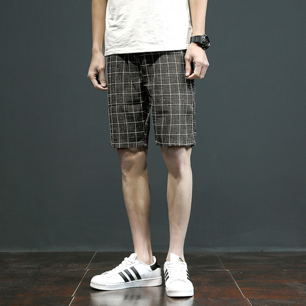 Pantaloni scurți eleganti în carouri, cu buzunare