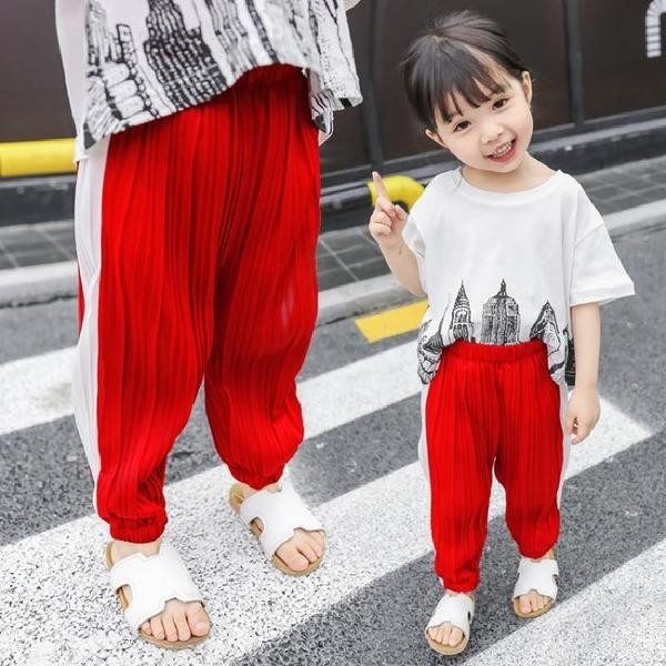 Pantaloni moderni pentru copii pentru o fată în mai multe culori - un model larg