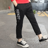 Pantaloni casual pentru băieți de culoare închisă cu inscripție