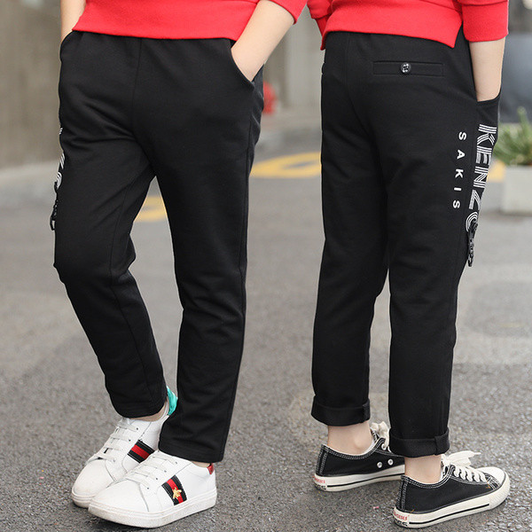 Pantaloni casual pentru băieți de culoare închisă cu inscripție