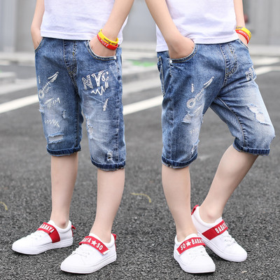 Blugi copii 7/8 cu inscriptie si motive rupte