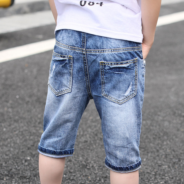 Blugi copii 7/8 cu inscriptie si motive rupte